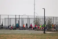 Pickleball court with players