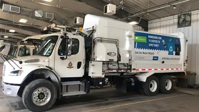 Waste and Recycling Truck in garage