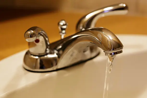 residential bathroom tap running water