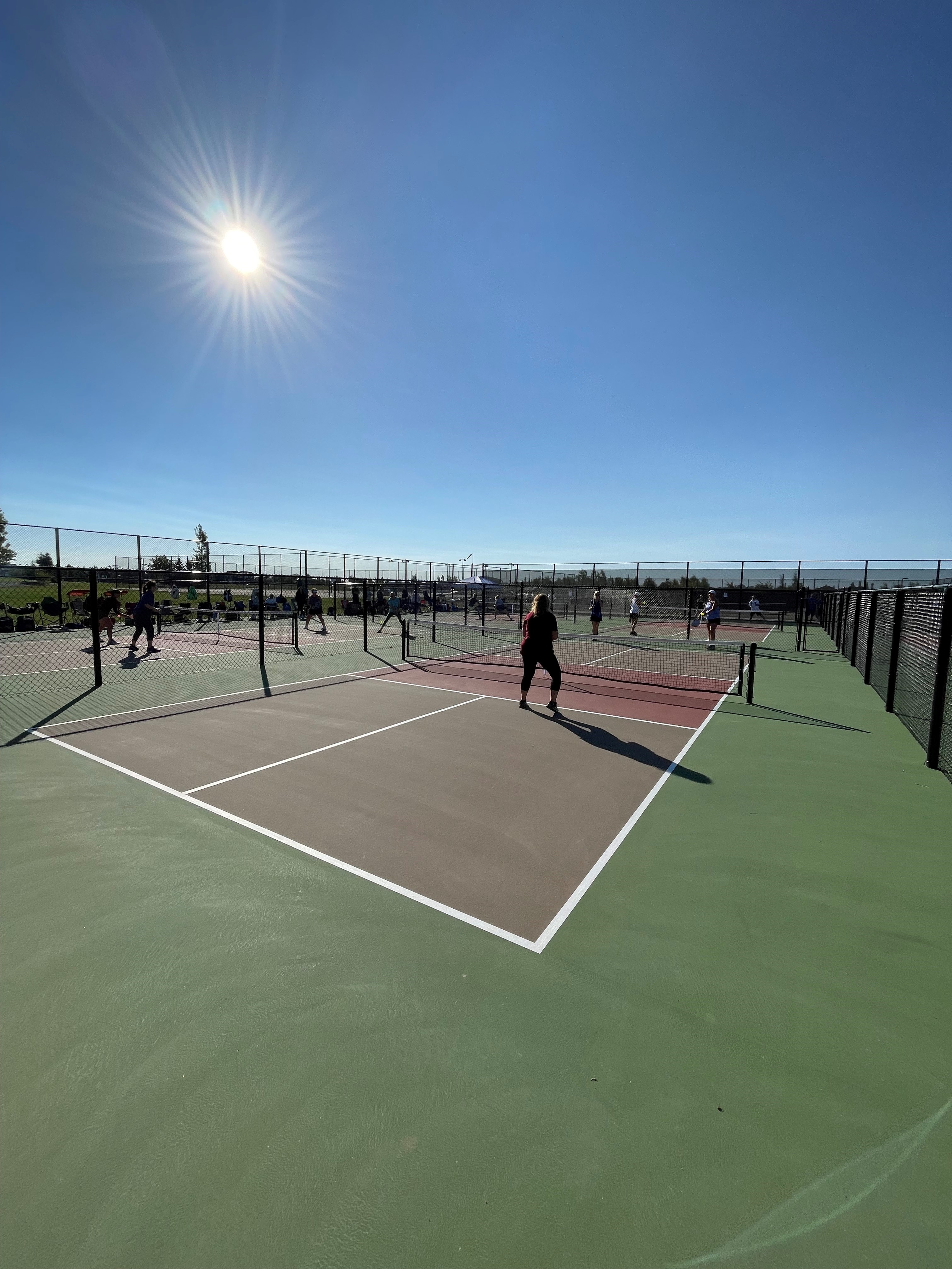 Image of Pickleball enthusiasts “relish” the completion of new courts