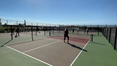 Legacy Pickleball courts sunny people playing pickleball