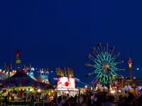 Whoop Up Days fairgrounds at night