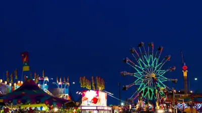 Whoop Up Days fairgrounds at night