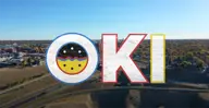 Oki logo over Landscape skyline