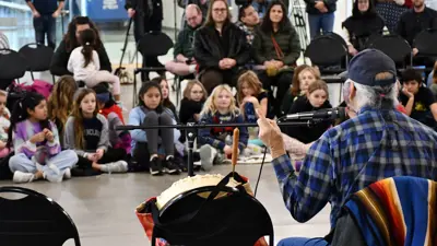 Blackfoot Winter Solstice guitar with kids