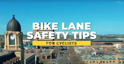Bike Lane Safety Tips for Cyclists clock tower in background