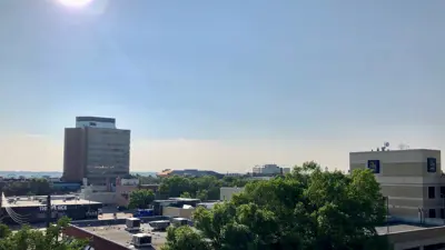 Sunny summer downtown photo Heat warning