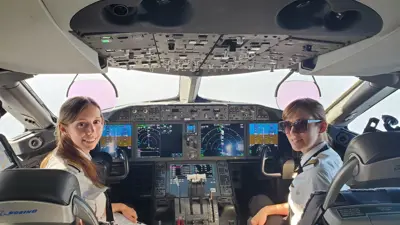 YQL 2 pilots in cockpit