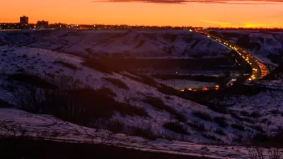 Whoop Up Dr sunset traffic