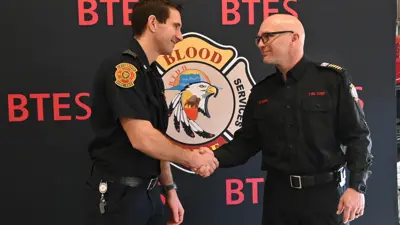 LFES DC McKeown and BT Chief Travis Coleman - shaking hands at announcement of fire dispatch - February 24, 2025