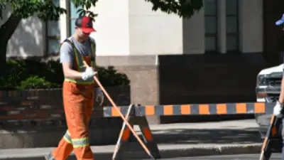 Road Construction Detour Baricade Crew