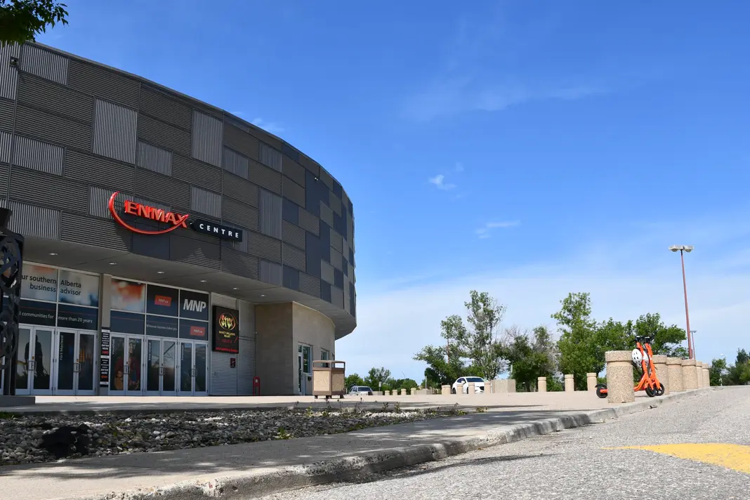 Enmax Building Orange Neuron Scooters 