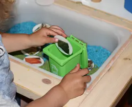 Toddler Oscar sorting organics 